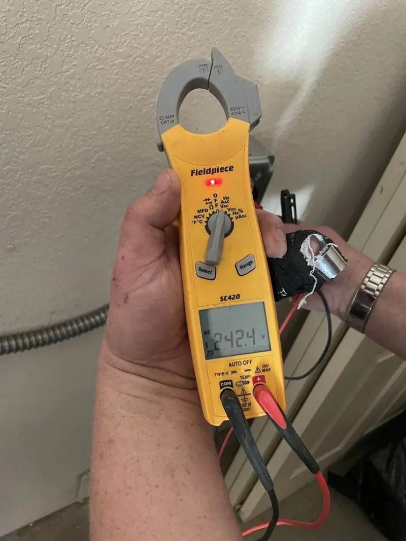 Voltage testing with clamp meter during Electrical Installation Services in Gardiner